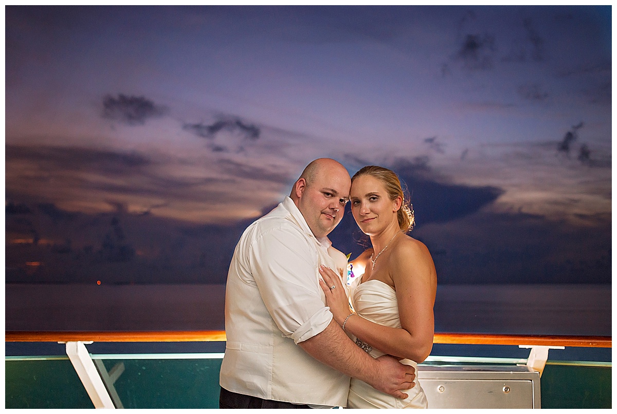 bride and groom on cruise ship with unbelievable purple sunset, , Destination wedding photography by Bokeh Love Photography
