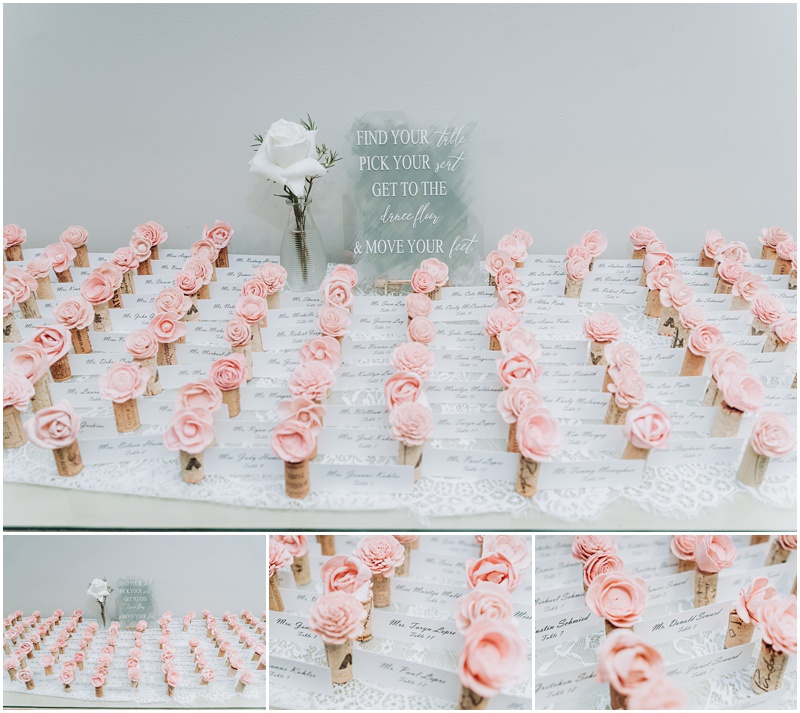 Professional Wedding Photo by Bokeh Love Photography, The Bradford Estate, Ceremony, place setting cards on display for wedding guests, pink flowers on white corks, on top of white table cloth
