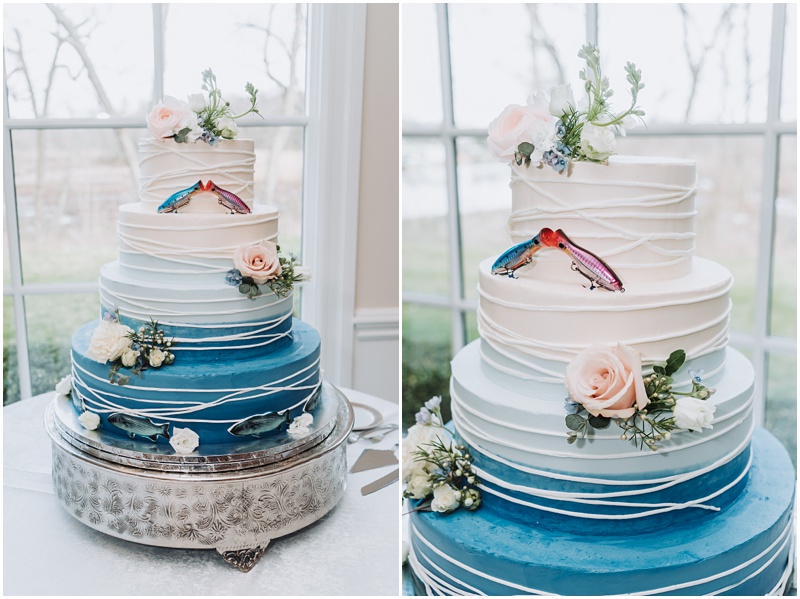 Professional Wedding Photo by Bokeh Love Photography, The Bradford Estate, bride and groom cutting the wedding cake that is designed with a beautiful white to blue ombre with Marlin, the fish on it, and lures