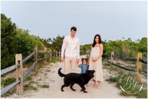 maternity session on beach with family